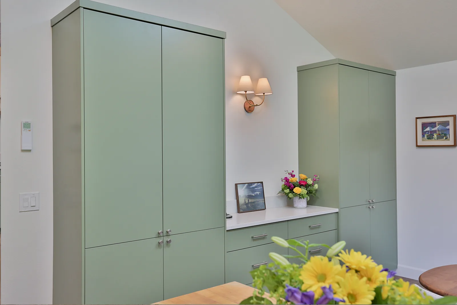 Coffee niche set between two full-height custom pantry towers